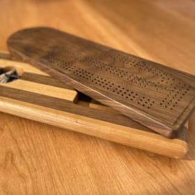 8. Handcrafted Walnut Crib Board item