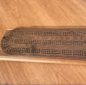 8. Handcrafted Walnut Crib Board item