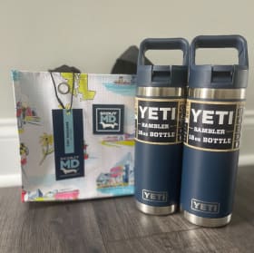 2 Navy Blue Yeti Rambler 18oz bottles and Tote item