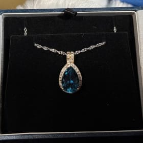Blue Topaz and Diamond Pendant item