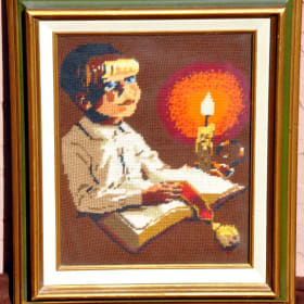 NEEDLEPOINT TAPESTRY FRAMED BOY READING BY CANDLE LIGHT item