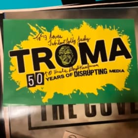 TROMA 50 YEARS POSTER SIGNED BY FOUNDER LLOYD KAUFMAN item