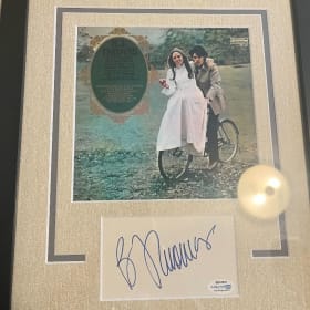 Autographed Commemorative (value $100) item