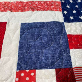 Walk In Our Boots Picnic Quilt item