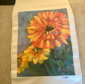 Tea towel gift wrapped (flower) item