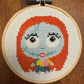 🧵 4" Handmade Cross-Stitch – Sally by Jo Means Jo item