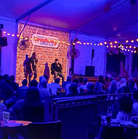 Laugh & Dine – Comedy Night for 10 + $50 Victoria’s Tratta item