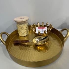 Lot 135 - Gold tray, gold scoop and candle from Buckeye Drug item