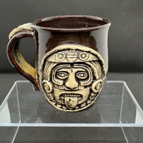 Pottery mug. Bright Brown item
