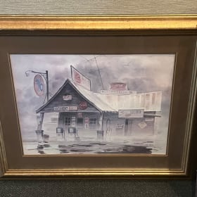 Framed Tom Bond Print. Frame has a scrape - needs touch up item