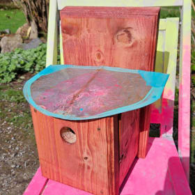 Kid assembled and painted Birdhouse item