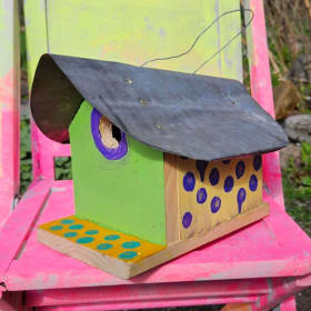 Kid assembled and painted Birdhouse item