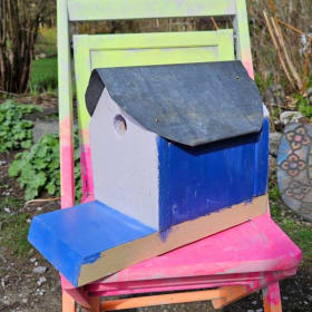 Kid assembled and painted Birdhouse item