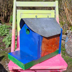 Kid assembled and painted Birdhouse item