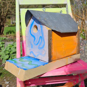 Kid assembled and painted Birdhouse item