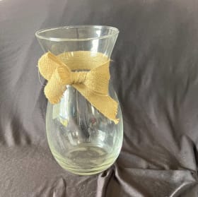 Cute glass vase with a burlap bow item