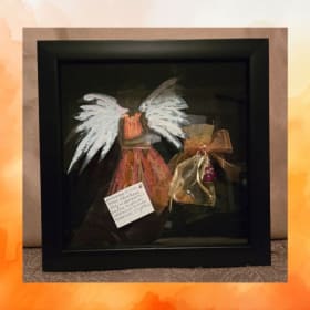 Framed Orange Angel Art item