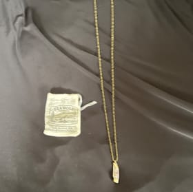 Tiny knife necklace item