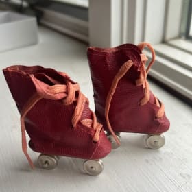 Vintage Red Doll Roller Skates item