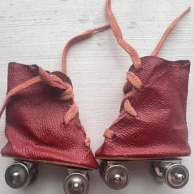 Vintage Red Doll Roller Skates item