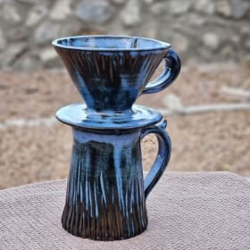 Blue coffee mug and pour-over. item