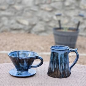 Blue coffee mug and pour-over. item