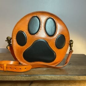 112. Leather Paw Purse item