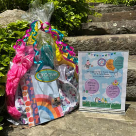 Groove Backpack + Giggling Pig Parents' Night Out item