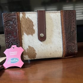Ladies "Justin" brand wallet with cowhide trim. $60 item