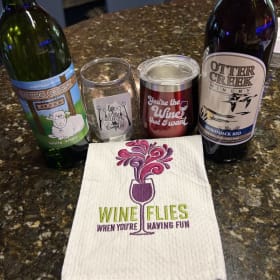 Basket # 23  Otter Creek red & white wine, cups & tea towel item