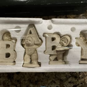 T05-Snowbabies Department 56 Baby Figurines item