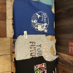 T63 (4) youth size small tops item