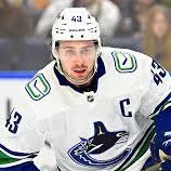 Signed Quinn Hughes Stick - Bauer Vapor Hyperlite 2 item