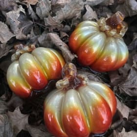 Small gold and orange pumpkin - brown stem item