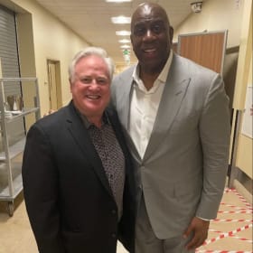 Magic Johnson autographed basketball & Laker tickets item