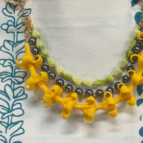 Printed and Embellished Hand Bag item