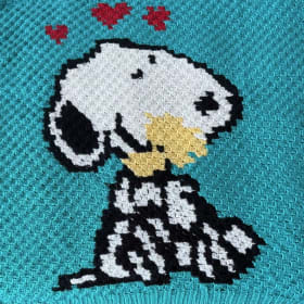 Crocheted Snoopy blanket item