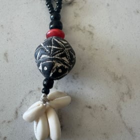 Artisan Beaded Keychain with Tribal Motif & Shell Detail item
