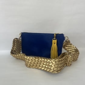 Cowhide Clutch donated by: Shop Taylor Gray item