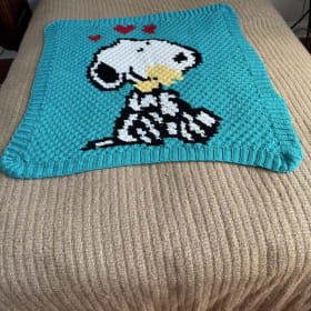Crocheted Snoopy blanket item