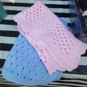 Hand-crocheted baby blankets valued at $30 item