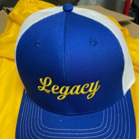 Blue and White Legacy Trucker Hat. item