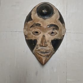 Rustic Hand-Carved Tribal Mask item