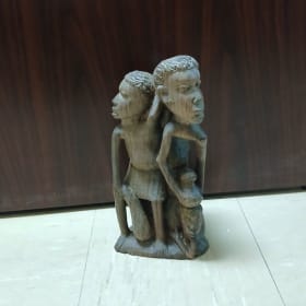 Hand-Carved Wooden Family Sculpture item