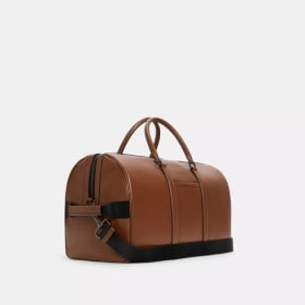 Classic Luxury: Coach Venturer Tote – Saddle Brown item