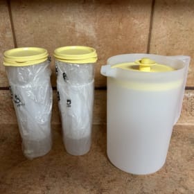Tupperware Pitcher and Cups w/Lids item