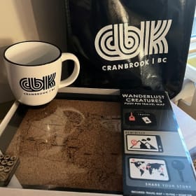 Mug and cork push pin map from Cranbrook Tourism. item