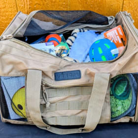 12. Travel Dog Bag with Toys item