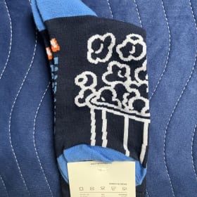 FANDANGO POPCORN SOCKS NEW MOVIE TICKET BUYING SERVICE item