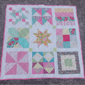 Fostering Cheer Quilt Donated by Susanne Leach item